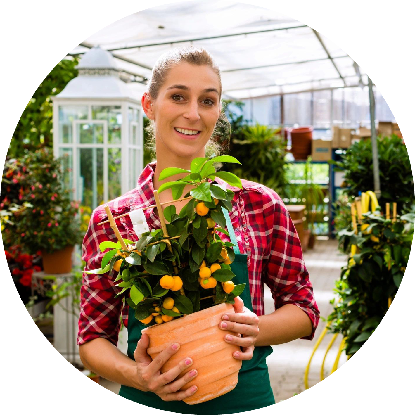 01 A woman holding a plant in her hands.